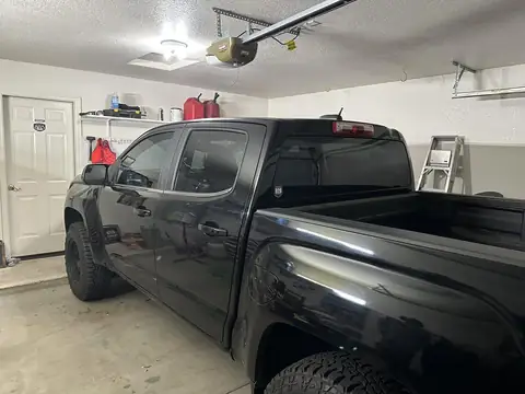 2015 GMC Canyon window tint: 2015 GMC Canyon getting Blackout package, 5% Premium Ceramic all doors and rear glass, 5% windshield strip, Dark smoke