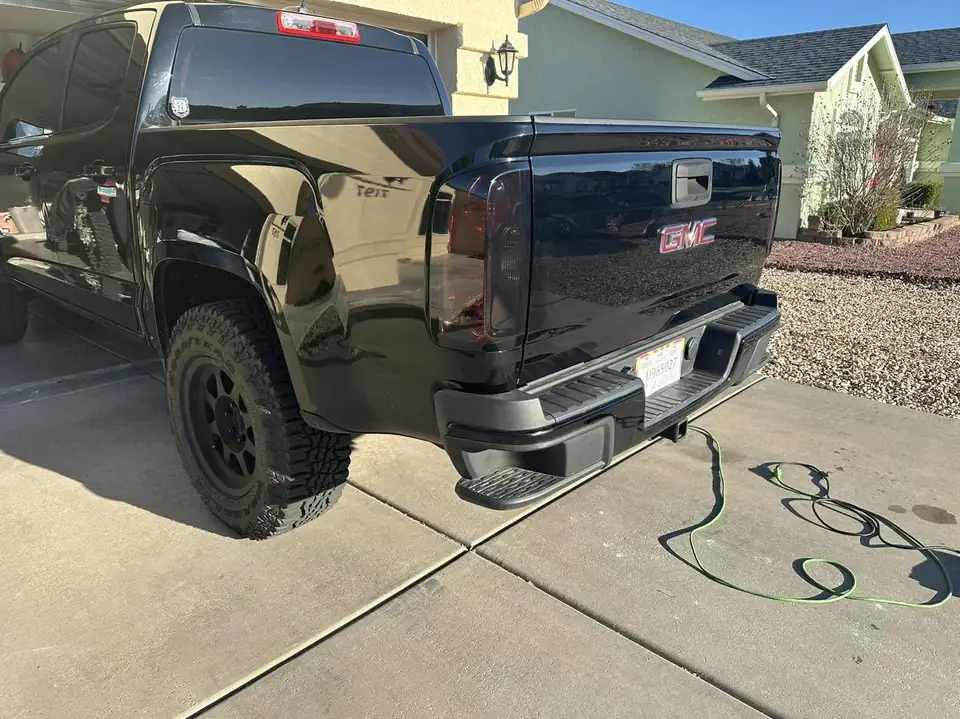 2015 GMC Canyon window tint: 2015 GMC Canyon getting Blackout package, 5% Premium Ceramic all doors and rear glass, 5% windshield strip, Dark smoke (view 5)