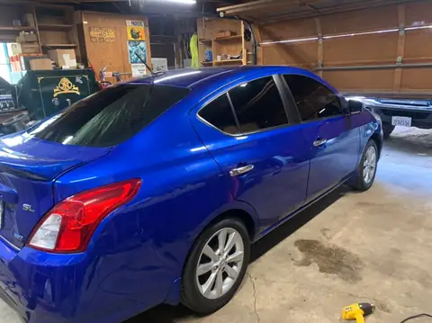 2015 Nissan Versa window tint: 15% ceramic on all windows and front windshield (view 3)