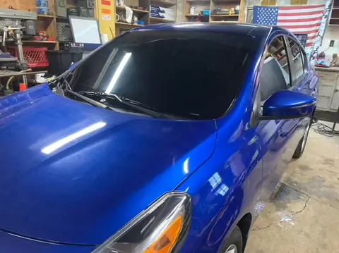 2015 Nissan Versa window tint: 15% ceramic on all windows and front windshield (view 4)