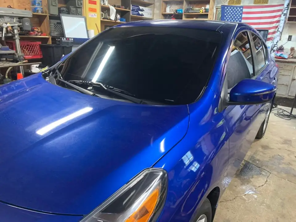 2015 Nissan Versa window tint: 15% ceramic on all windows and front windshield (view 4)