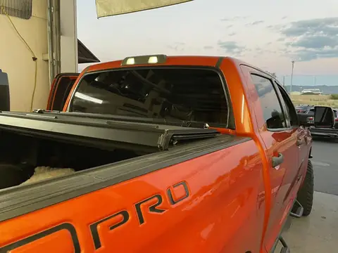 2015 Toyota Tundra window tint: Removed old tint from rear windshield, 5% Premium Ceramic installed