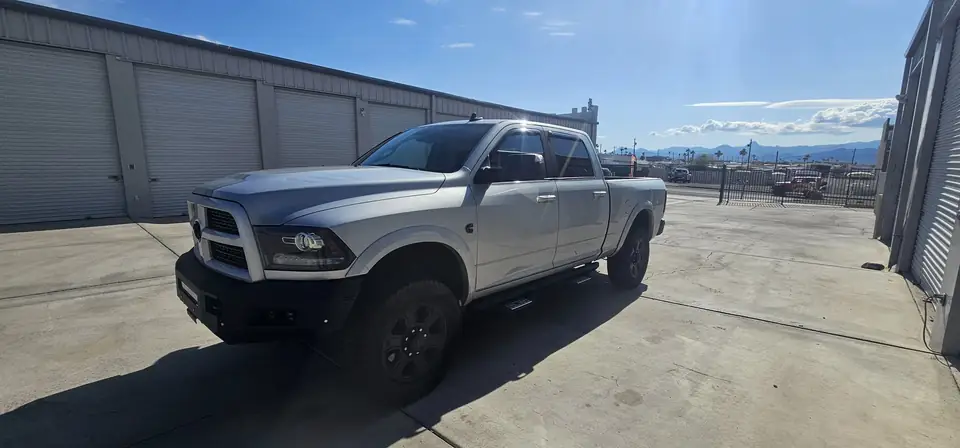 2016 Dodge Ram 2500 window tint: Installed 50% Windshield, Installed 5% on all sides and rear glass, Installed 3% Windshield Visor Strip (view 3)