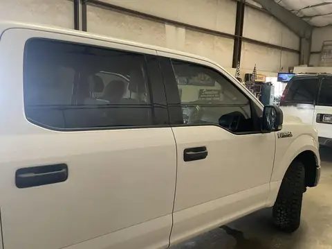 2016 Ford F-150 window tint: Premium 35% front door windows (view 2)