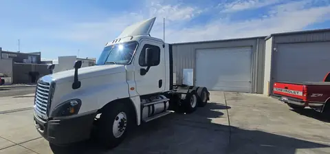 2016 Freightliner Cascadia window tint: 5% all sides & rear glass with a 3% Windshield Visor Strip (view 3)