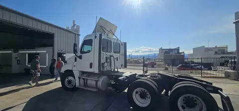 2016 Freightliner Cascadia window tint: 5% all sides & rear glass with a 3% Windshield Visor Strip (view 5)