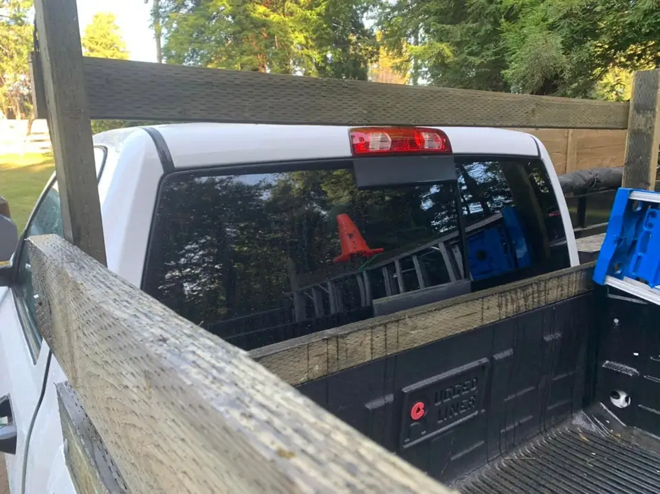 2016 Ram 1500 window tint: 15% over the rear privacy glass, 5% medium visor strip (view 3)