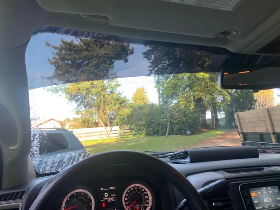 2016 Ram 1500 window tint: 15% over the rear privacy glass, 5% medium visor strip (view 4)