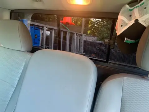 2016 Ram 1500 window tint: 15% over the rear privacy glass, 5% medium visor strip (view 5)