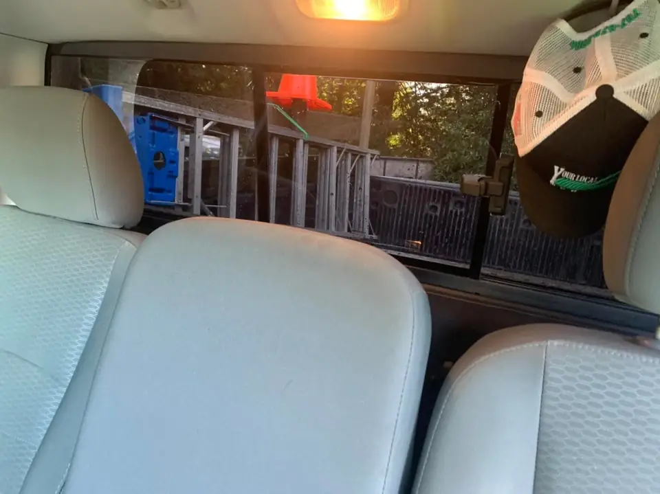 2016 Ram 1500 window tint: 15% over the rear privacy glass, 5% medium visor strip (view 5)