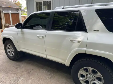 2016 Toyota 4Runner window tint: 2016 Toyota 4Runner 15% Front two doors, 5% visor strip (view 2)