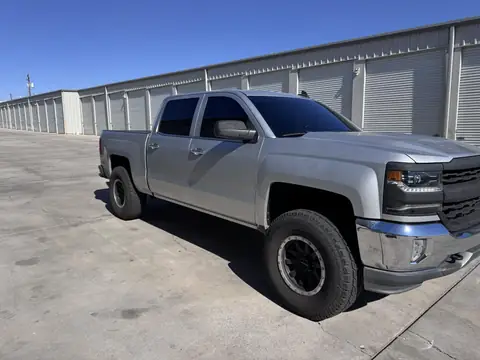 2017 Chevy Silverado window tint: Removed the faded tint from front doors, Installed 5% C-IR sides and rear, 50% C-IR full windshield, 5% sunstrip
