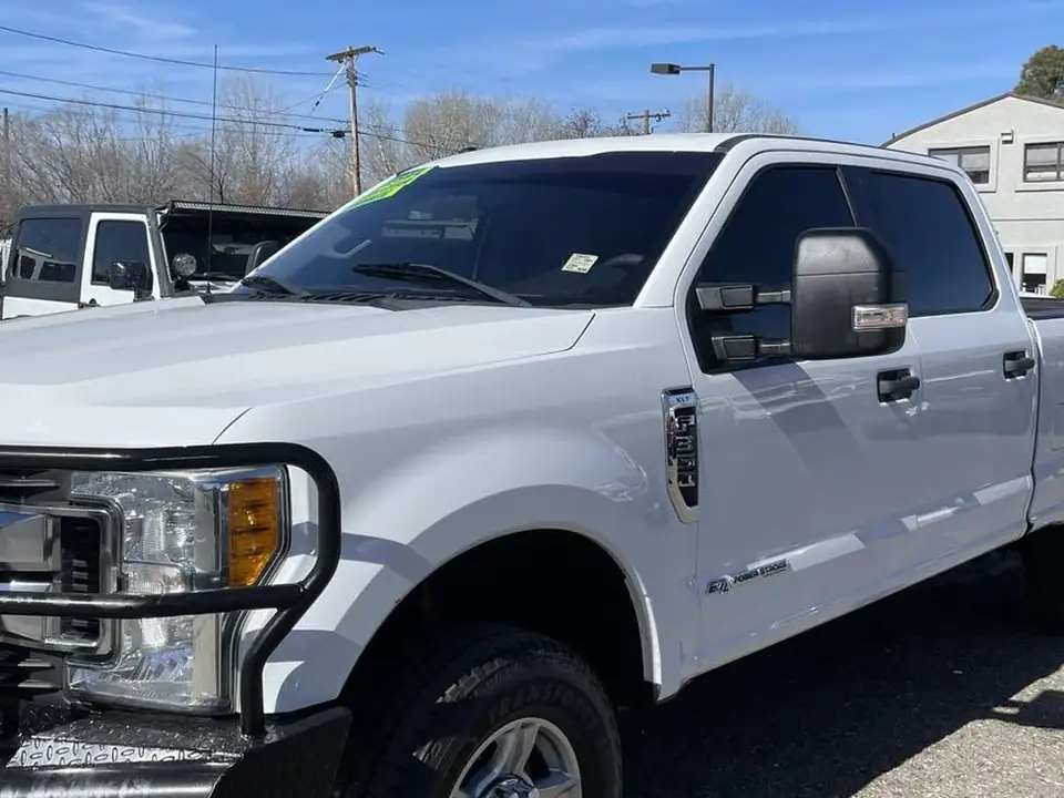 2017 Ford F-350 window tint: Premium 5% rear windows, Premium 15% front doors, 5% strip on windshield (view 2)