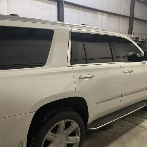 2018 Cadillac Escalade window tint: Premium 5% over front 35% and rear factory privacy glass (view 2)