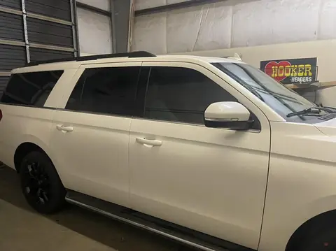 2018 Ford Expedition window tint: Premium 35% front doors, Premium 5% over factory privacy rear doors and rear cargo windows (view 2)