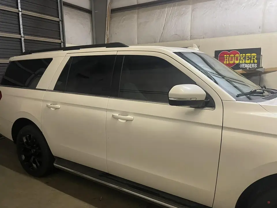 2018 Ford Expedition window tint: Premium 35% front doors, Premium 5% over factory privacy rear doors and rear cargo windows (view 2)
