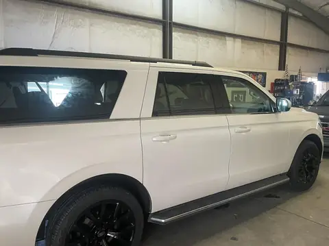 2018 Ford Expedition window tint: Premium 35% front doors, Premium 5% over factory privacy rear doors and rear cargo windows (view 3)