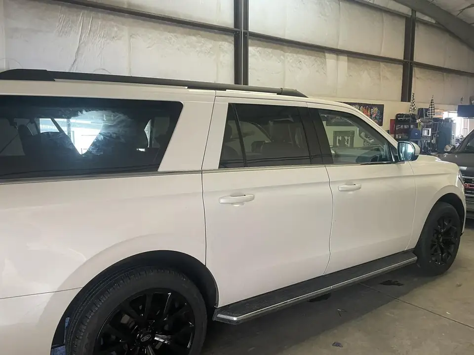 2018 Ford Expedition window tint: Premium 35% front doors, Premium 5% over factory privacy rear doors and rear cargo windows (view 3)