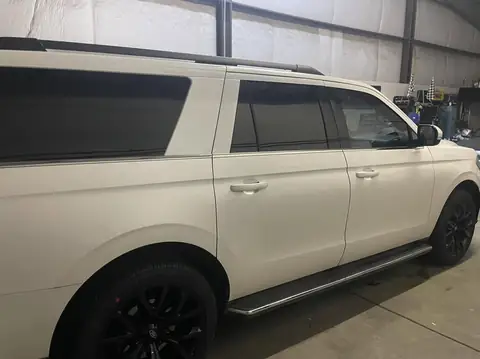 2018 Ford Expedition window tint: Premium 35% front doors, Premium 5% over factory privacy rear doors and rear cargo windows (view 4)