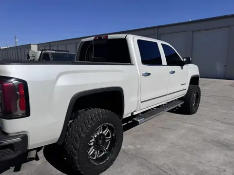2018 GMC Sierra window tint: Removal on front doors, 5% C-IR all the way around, 35% C-IR full windshield (view 2)