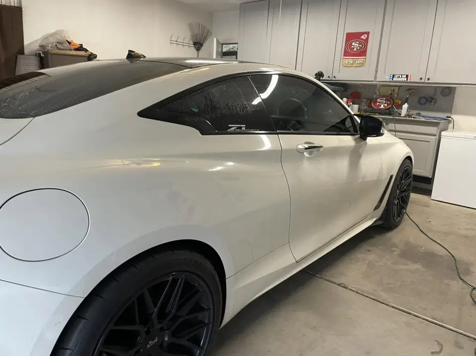 2018 Infiniti Q60 window tint: Removed old faded tint from front windows, Installed 5% premium ceramic on all windows (view 2)