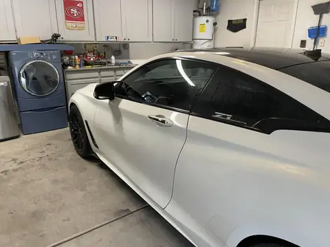 2018 Infiniti Q60 window tint: Removed old faded tint from front windows, Installed 5% premium ceramic on all windows (view 3)