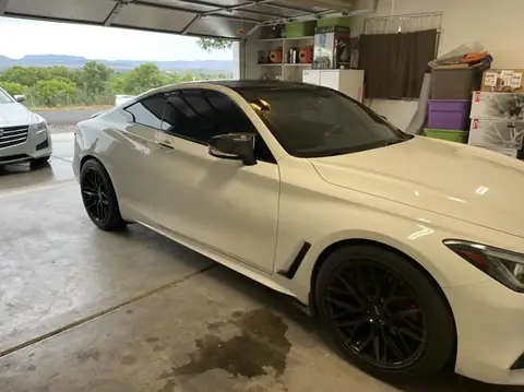 2018 Infiniti Q60 window tint: Removed old faded tint from front windows, Installed 5% premium ceramic on all windows (view 4)
