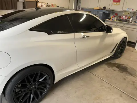 2018 Infiniti Q60 window tint: Removed old faded tint from front windows, Installed 5% premium ceramic on all windows (view 5)