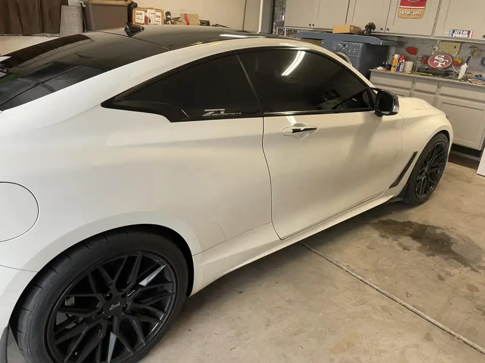 2018 Infiniti Q60 window tint: Removed old faded tint from front windows, Installed 5% premium ceramic on all windows (view 5)