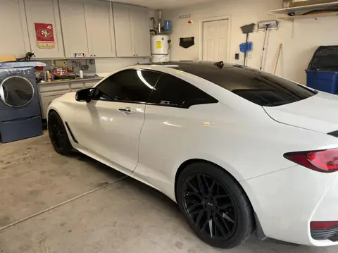 2018 Infiniti Q60 window tint: Removed old faded tint from front windows, Installed 5% premium ceramic on all windows (view 6)