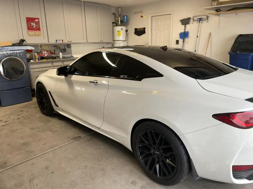 2018 Infiniti Q60 window tint: Removed old faded tint from front windows, Installed 5% premium ceramic on all windows (view 6)