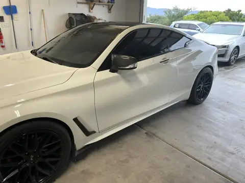 2018 Infiniti Q60 window tint: Removed old faded tint from front windows, Installed 5% premium ceramic on all windows (view 7)