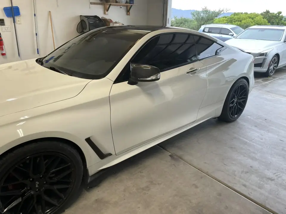 2018 Infiniti Q60 window tint: Removed old faded tint from front windows, Installed 5% premium ceramic on all windows (view 7)
