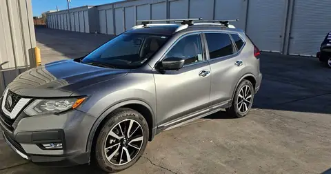 2018 Nissan Rogue window tint: 40% over rear half privacy windows (8% read), 20% front door windows, 3% windshield strip