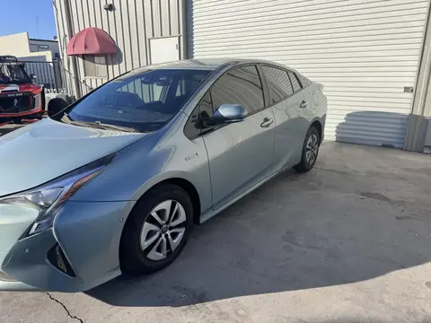 2018 Toyota Prius window tint: 15% C-IR rear half and front pocket windows, 35% C-IR front doors and sunstrip