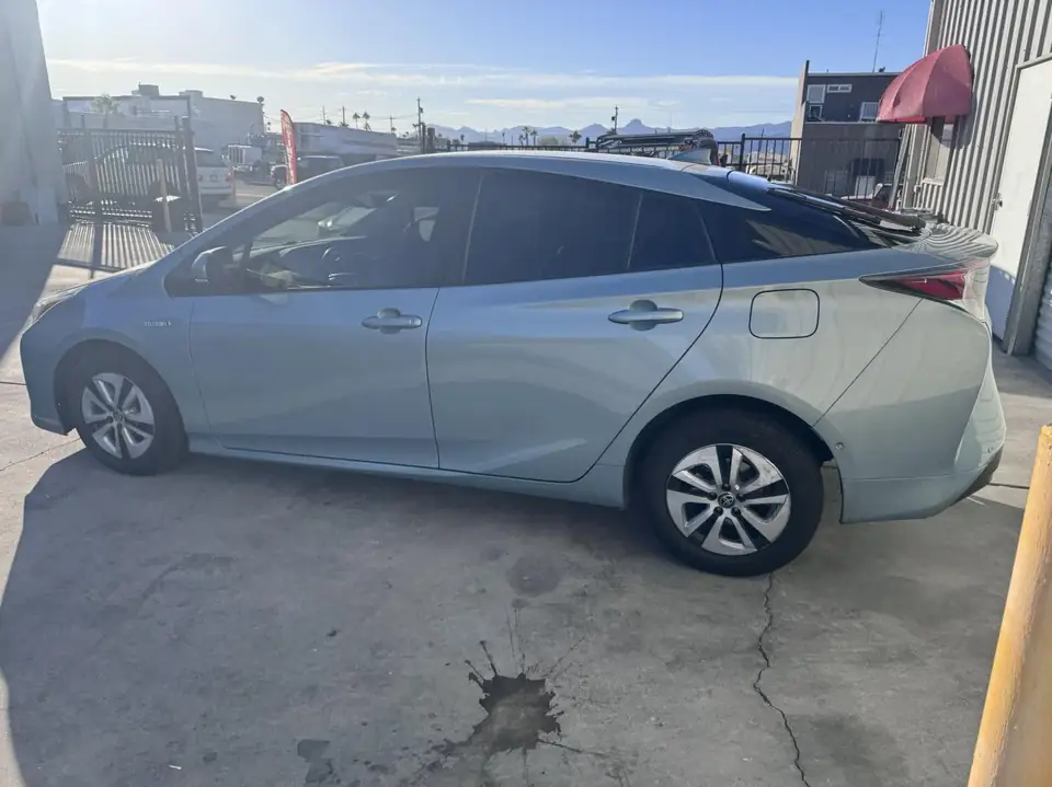 2018 Toyota Prius window tint: 15% C-IR rear half and front pocket windows, 35% C-IR front doors and sunstrip (view 2)
