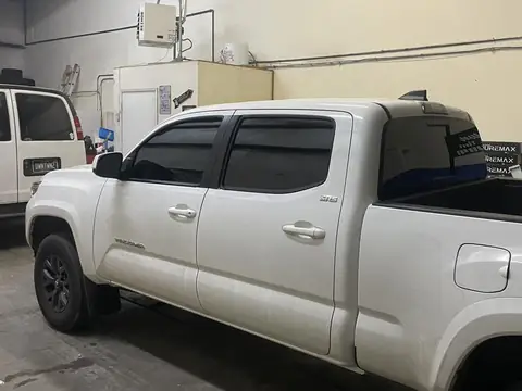 2018 Toyota Tacoma window tint: Standard 5% over rear privacy glass, Ceramic 5% front 2 windows