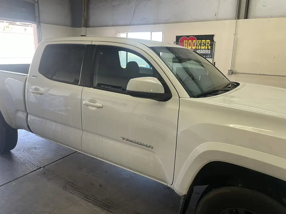 2018 Toyota Tacoma window tint: Standard 5% over rear privacy glass, Ceramic 5% front 2 windows (view 2)