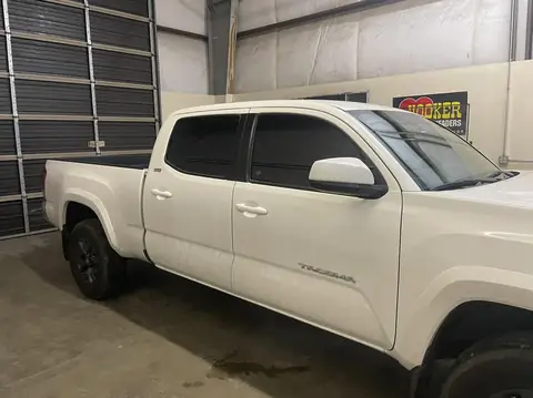 2018 Toyota Tacoma window tint: Standard 5% over rear privacy glass, Ceramic 5% front 2 windows (view 3)