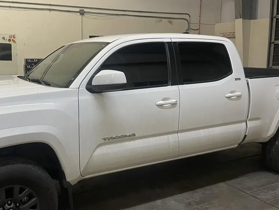2018 Toyota Tacoma window tint: Standard 5% over rear privacy glass, Ceramic 5% front 2 windows (view 4)