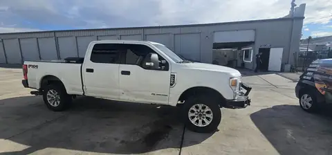 2020 Ford F-250 window tint: Remove old tint from front door windows, Installed 20% on front 2 door windows, Installed 40% on Windshield (view 4)