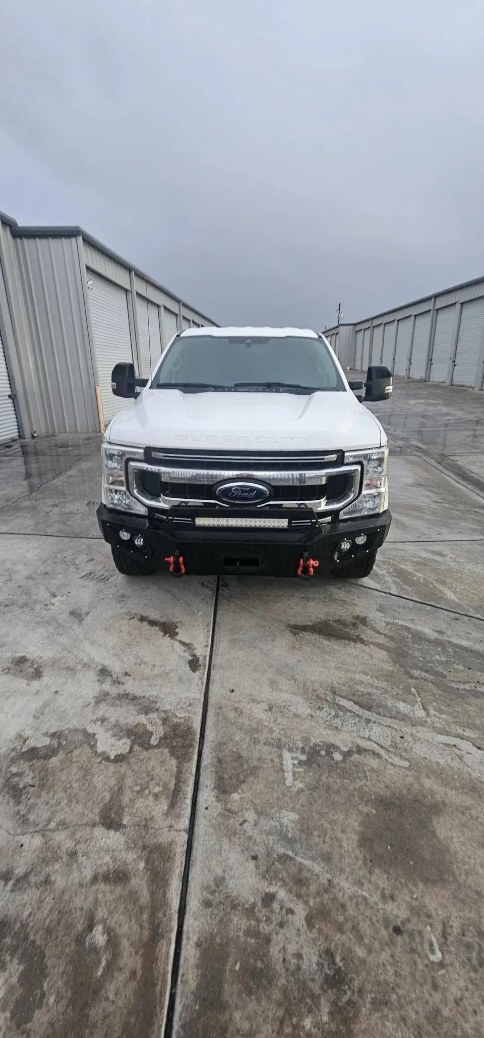 2020 Ford F-250 window tint: Remove old tint from front door windows, Installed 20% on front 2 door windows, Installed 40% on Windshield (view 5)