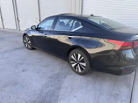 2020 Nissan Altima window tint: 5% rear doors and back window, 15% front doors, 5% windshield strip (view 3)