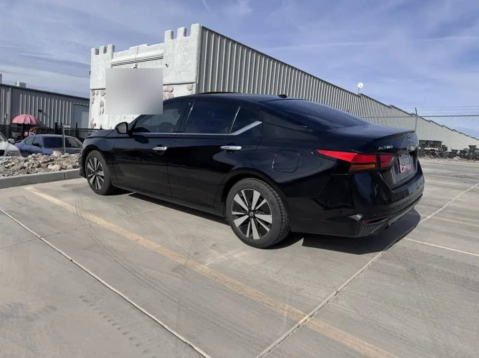 2020 Nissan Altima window tint: 5% rear doors and back window, 15% front doors, 5% windshield strip (view 4)