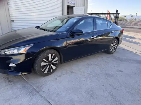 2020 Nissan Altima window tint: 5% rear doors and back window, 15% front doors, 5% windshield strip (view 5)