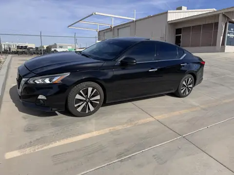 2020 Nissan Altima window tint: 5% rear doors and back window, 15% front doors, 5% windshield strip (view 6)