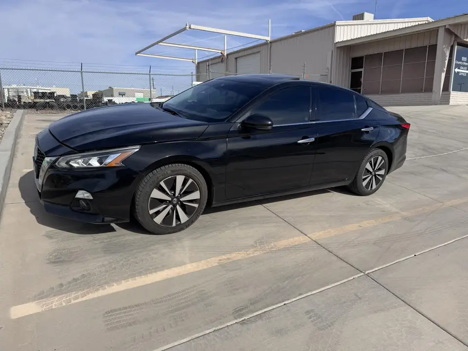2020 Nissan Altima window tint: 5% rear doors and back window, 15% front doors, 5% windshield strip (view 6)
