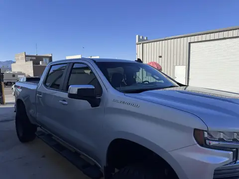 2021 Chevy Silverado window tint: Removal on front doors, 5% rear half, 15% fronts, 5% sunstrip