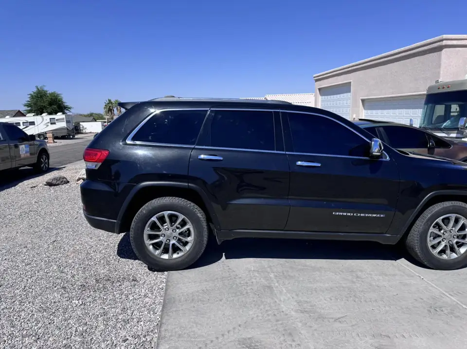 2021 Jeep Cherokee window tint: 15% Carbon Ceramic rear windows to meter at 2%, 5% Carbon Ceramic front doors, 5% sun strip (view 2)
