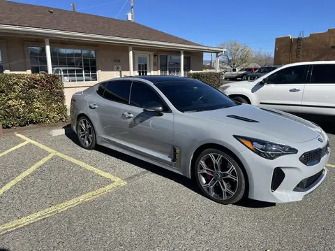 2021 Kia Stinger window tint: Removed all old faded tint, 15% Ceramic front doors, 5% Ceramic rear doors, 5% sunstrip @8inch (view 2)
